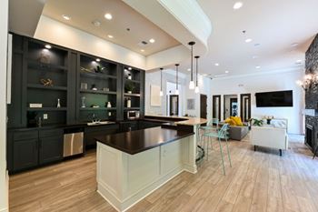 A kitchen with a large island 